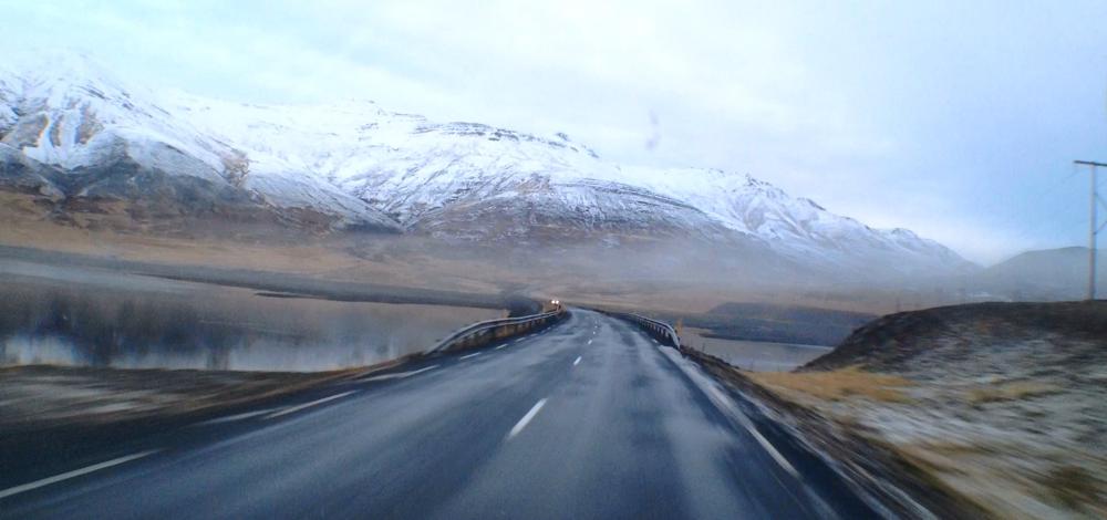 Roads in Iceland have differing classes and can be restricted to 4WD vehicles or even flagged as impassible. Even the main ring road #1 is mostly paved, mostly 2 lanes with no shoulder, spotted with small single-lane bridges, and darts through many spaces where weather can change in an instant from warm sun, to high winds, fog, and blustery snow. <i>Always</i> drive with caution and watch the forecasts.
